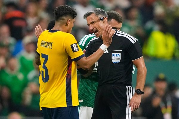 Why are World Cup refs giving red cards to players covering their mouths when confronting opponents?