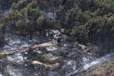 Wildfires kill a father and son in Greece and prompt evacuations in 2 villages