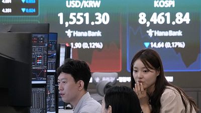 Asian stocks slide on chip sell-off as markets await US jobs data