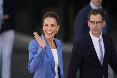 Tickets please: Kate surprises tennis fans in Wimbledon queue
