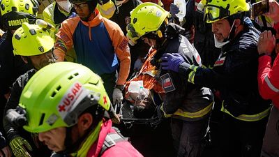 Venezuelan security guard pulled alive from basement eight days after twin quakes