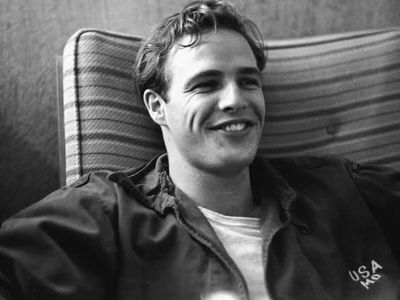 Quote of the Day by Marlon Brando: 'If we are not our brother's keeper, at least let us not be...'- A powerful reflection on compassion, humanity, justice, responsibility, and the moral duty to do no harm by The Godfather actor