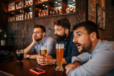 Sports fans are taking on credit card debt for tickets that cost more than a mortgage payment—and still, a fifth can't even afford watching it at bars