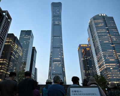 China says man who flew plane into Beijing skyscraper had mental health problems
