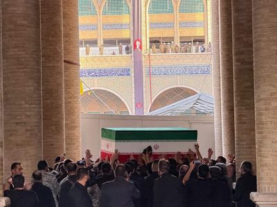 Ali Khamenei's body arrives in Tehran ahead of funeral expected to draw millions