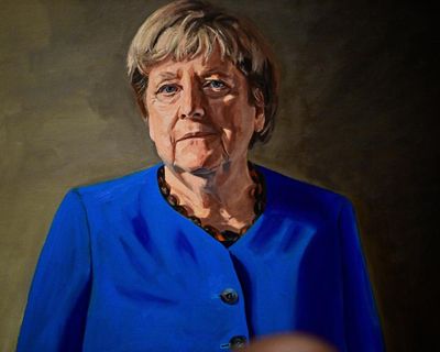 ‘Our little adventure’: Angela Merkel unveils portrait of herself in Berlin