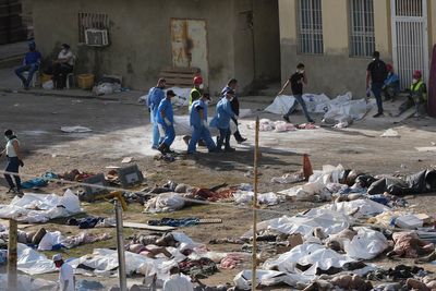 A push to identify bodies as deaths multiply in Venezuela after twin earthquakes