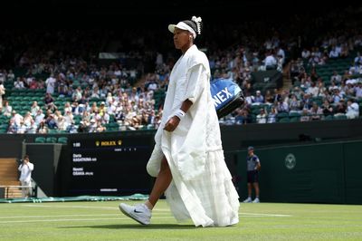 Naomi Osaka aces Wimbledon fashion once again as she walks onto court in flowing embroidered cloak