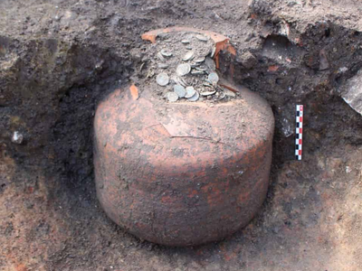 Nearly 40,000 Roman coins lay hidden beneath a French village for 1,800 years until archaeologists uncovered them