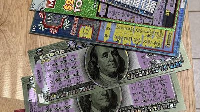 A scratch card participant, begging for change, wins half a million in Pesaro but can't claim it due to lack of residency permits