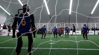 Humanoid robots showcase football skills