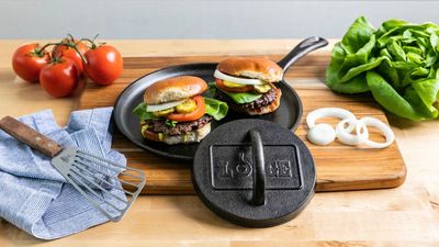 This $19 Lodge Cast Iron Press Makes Perfectly Flat, Diner-Style Burgers – Just in Time for Summer Cookouts