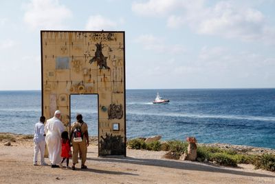 Pope defends migrants at Mediterranean island frontier