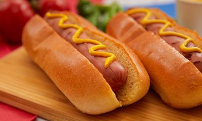 Americans will eat 150 million hot dogs today. One specific American is predicted to eat 70 of them