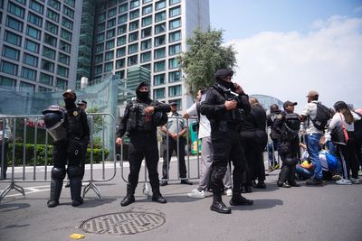 Over 100 riot police guard England hotel after hostile reception in Mexico