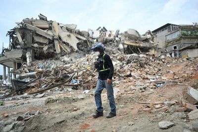 An 'angel' in darkness after Venezuela's deadly quakes