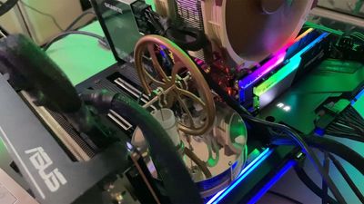 Windows guru uses 19th-century Stirling Engine tech for auxiliary cooling on AMD Threadripper 3970X system — waste heat energy spins the $40 engine's flywheel