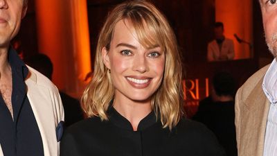 Margot Robbie makes a case for swapping wide-leg trousers for trending long shorts in this sharp evening look