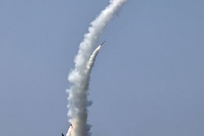 North Korean leader Kim observes weapons tests from new naval destroyer