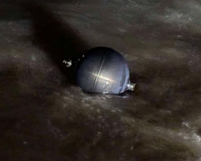Mysterious debris found on Queensland beaches could be ‘space balls’ – and may contain toxic rocket fuel