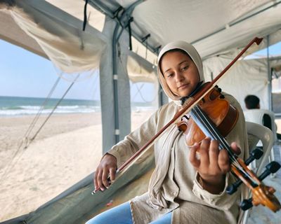 Gaza’s musicians reopen bomb-shattered conservatory – in tents