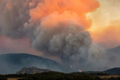 Thousands flee raging wildfires in southern Europe