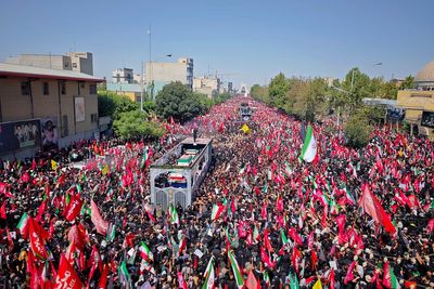Huge crowds line streets of Tehran for Khamenei funeral procession as mourners chant for revenge
