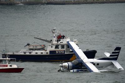Eight people rescued after seaplane lands on New York City East River