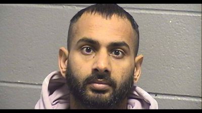 Indian tractor-trailer driver, busy with his phone, runs over 23-year-old man in Chicago who was changing tire