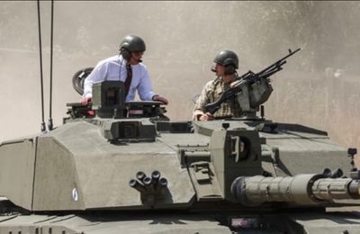 King Charles takes tank ride as Prince Harry fires fresh blows at Royal Family