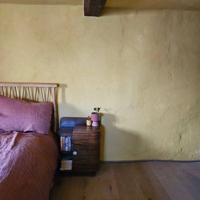 I avoided skirting boards in my lime-plastered spare room and used this unusual rustic alternative instead