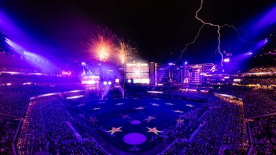 Timing fireworks photos is hard enough, but this sports photographer managed to get fireworks and lightning in one shot
