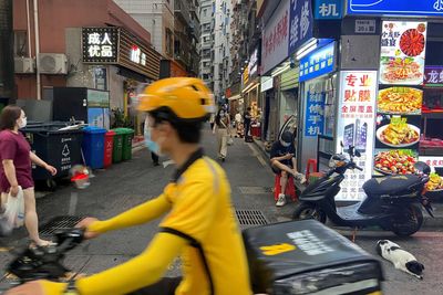 China's booming gig economy masks job market pain, strains welfare system