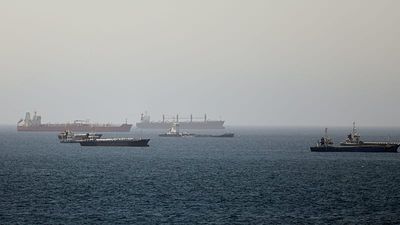 Oil tanker hit by 'unknown projectile' in Strait of Hormuz, British military says