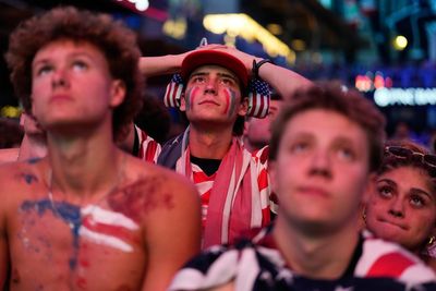 American fans saw a night of hope turn to World Cup disappointment, in photos