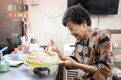 'Working keeps me alive and valuable,' says 90-year-old who still decorates cakes every day