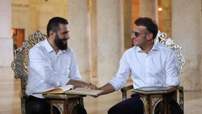 Bombs injure 18 in Damascus as Macron makes historic visit to Syria