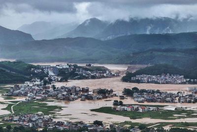 China battered by extreme weather: Floods, tornadoes & landslides kills over 20, videos capture destruction