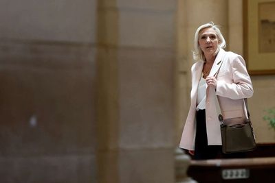 French court opens door to possible Le Pen presidential run, with ankle tag