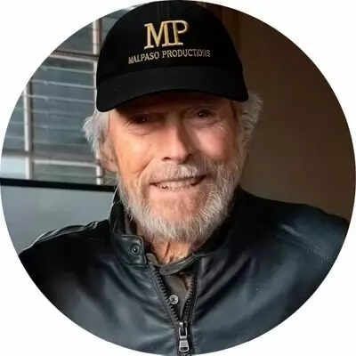 Quote of the Day by Clint Eastwood: “If you want a guarantee, buy a toaster. What is life without...?” - Inspiring life lessons on courage, resilience, bold decisions, embracing uncertainty, persistent effort, and meaningful success from the Dirty Harry actor and four-time Academy Award winner