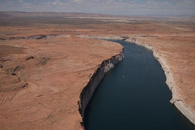 Lake Powell, a vital reservoir, plunges toward unprecedented low levels as water crisis deepens in US west