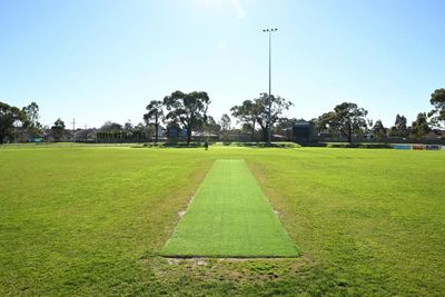 ‘Accident waiting to happen’: player’s death raises alarm over risk of concrete cricket pitches in Australian rules football