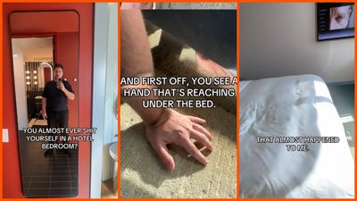 Washington Man drops something in his hotel room. When he bends to get it, a hand reaches out from under the bed