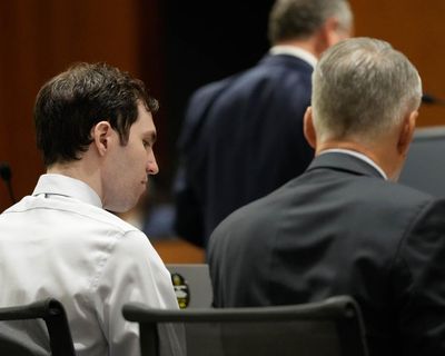 Prosecutors say video shows suspect in Charlie Kirk killing climbing on to roof