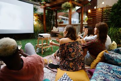 From Centre Court to kick-off: How to style an elegant watch party this weekend (and the outdoor projector that will arrive in time)