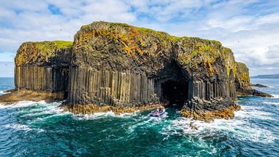 Scotland's Fingal's Cave is a 60-million-year-old volcanic wonder where Atlantic Ocean creates haunting natural music
