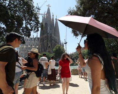 Barcelona registers highest temperature in 112 years as French nuclear reactor shuts down due to extreme heat – as it happened