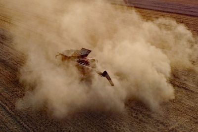 Heat prompts early harvests and hosepipe bans as European record confirmed