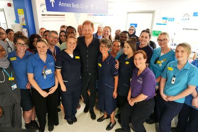 Harry mobbed by nurses on visit to children’s hospital