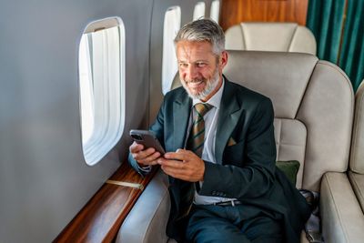 Self-made multimillionaire says Canadians 'give no money away' compared with Americans—research shows U.S. giving is more than twice as high
